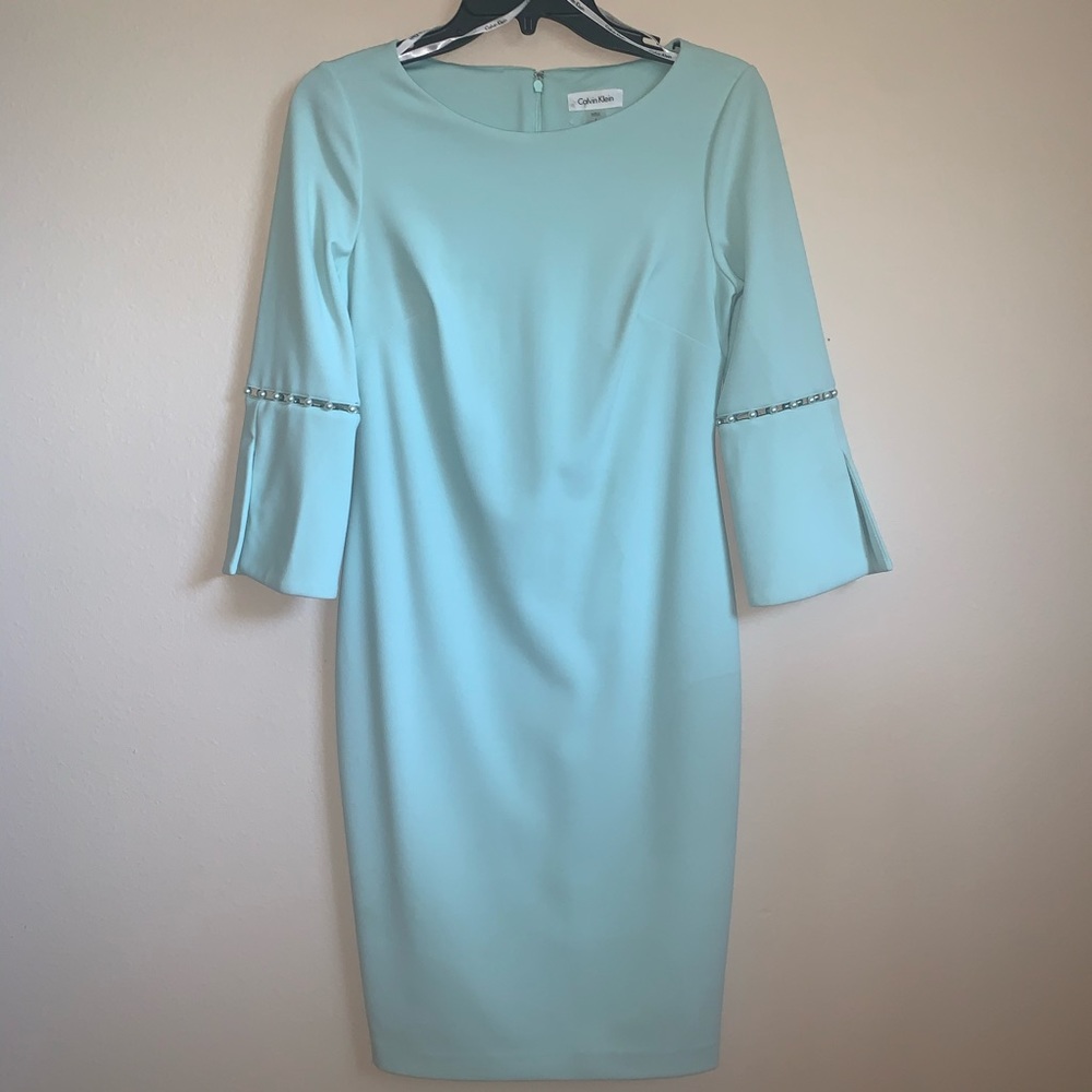 Calvin Klein dress with pearls on the sleeves